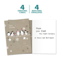 Load image into Gallery viewer, The cover and inside of Tree-Free’s Balancing Penguins card, along with the following text: “4 greeting cards, 4 matching envelopes”