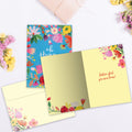 Load image into Gallery viewer, The inside of Tree-Free’s Oh Happy Day card, with the cover and envelope in the background.