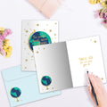 Load image into Gallery viewer, The inside of Tree-Free’s The World Needs card, with the cover and envelope in the background.