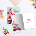 Load image into Gallery viewer, The inside of Tree-Free’s Cumpleanos Truck card, with the cover and envelope in the background.