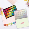 Load image into Gallery viewer, The inside of Tree-Free’s Feliz Cupcakes card, with the cover and envelope in the background.