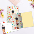 Load image into Gallery viewer, The inside of Tree-Free’s Cumpleanos Mouse card, with the cover and envelope in the background.