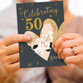 Load image into Gallery viewer, Lifestyle image(s) featuring Tree-Free’s Golden Celebration card