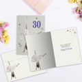 Load image into Gallery viewer, The inside of Tree-Free’s Exuberant 30 card, with the cover and envelope in the background.