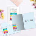 Load image into Gallery viewer, The inside of Tree-Free’s Celebrating 100 card, with the cover and envelope in the background.