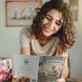 Load image into Gallery viewer, Lifestyle image(s) featuring Tree-Free’s Dogopoly card