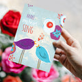 Load image into Gallery viewer, Lifestyle image(s) featuring Tree-Free’s Singing Hearts card