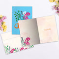 Load image into Gallery viewer, The inside of Tree-Free’s Feel Better Tea card, with the cover and envelope in the background.