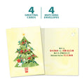 Load image into Gallery viewer, The cover and inside of Tree-Free’s Navidad Tree card, along with the following text: “4 greeting cards, 4 matching envelopes”