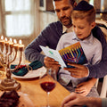 Load image into Gallery viewer, Lifestyle image(s) featuring Tree-Free’s Menorah Glow card