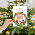 Load image into Gallery viewer, Lifestyle image(s) featuring Tree-Free’s Joyous Cat card