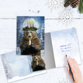 Load image into Gallery viewer, The inside of Tree-Free’s Bear Light card, with the cover and envelope in the background.