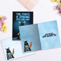 Load image into Gallery viewer, The inside of Tree-Free’s Force is Strong Son card, with the cover and envelope in the background.