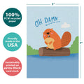 Load image into Gallery viewer, The cover of Tree-Free’s Beaver Dam card with lines demonstrating its 5x7 dimensions, along with the following text: “100% PCW recycled paper, proudly made in the USA, sustainably printed on extra-thick card stock”