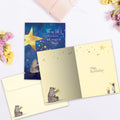 Load image into Gallery viewer, The inside of Tree-Free’s Stardust Bear card, with the cover and envelope in the background.