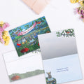 Load image into Gallery viewer, The inside of Tree-Free’s Bunny Queen card, with the cover and envelope in the background.