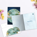 Load image into Gallery viewer, The inside of Tree-Free’s More Wonderful World card, with the cover and envelope in the background.