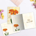 Load image into Gallery viewer, The inside of Tree-Free’s Bee Wishes card, with the cover and envelope in the background.