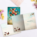 Load image into Gallery viewer, The inside of Tree-Free’s Happiness Balloons card, with the cover and envelope in the background.