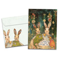 Load image into Gallery viewer, Cover of Earth Rabbits Birthday card (featuring serif text below artwork of two rabbits sitting behind the world surrounded by flowers and stars) and its matching envelope