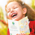 Load image into Gallery viewer, Lifestyle image(s) featuring Tree-Free’s Magical Floral Unicorn Daughter card