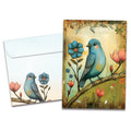 Load image into Gallery viewer, Cover of Flowery Bluebird All Occasion card (featuring artwork of a bluebird sitting on a floral tree branch) and its matching envelope