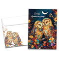 Load image into Gallery viewer, Cover of Starry Owls Anniversary card (featuring script text above artwork of two owls sitting on a floral tree branch under the moon) and its matching envelope