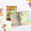 Load image into Gallery viewer, The inside of Tree-Free’s Some People card, with the cover and envelope in the background.