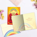 Load image into Gallery viewer, The inside of Tree-Free’s Laughing Buddha card, with the cover and envelope in the background.
