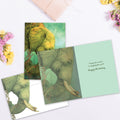 Load image into Gallery viewer, The inside of Tree-Free’s Listen card, with the cover and envelope in the background.