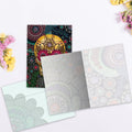 Load image into Gallery viewer, The inside of Tree-Free’s Sugar Skull Paisley card, with the cover and envelope in the background.