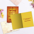 Load image into Gallery viewer, The inside of Tree-Free’s Improved With Wine card, with the cover and envelope in the background.