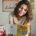 Load image into Gallery viewer, Lifestyle image(s) featuring Tree-Free’s Bursting With Joy card