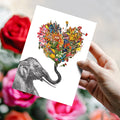 Load image into Gallery viewer, Lifestyle image(s) featuring Tree-Free’s Love Elephant card