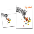Load image into Gallery viewer, The cover of Tree-Free's Checking In Giraffe Support Card card, along with its matching envelope.
