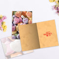Load image into Gallery viewer, The inside of Tree-Free’s Candy Hearts Valentine card, with the cover and envelope in the background.