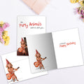 Load image into Gallery viewer, The inside of Tree-Free’s Party Animals card, with the cover and envelope in the background.