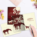 Load image into Gallery viewer, The inside of Tree-Free’s Four Legged Friends card, with the cover and envelope in the background.