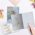 Load image into Gallery viewer, The inside of Tree-Free’s Life Is A Balance Support Card card, with the cover and envelope in the background.