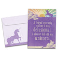 Load image into Gallery viewer, The cover of Tree-Free's Fell Off Unicorn card, along with its matching envelope.