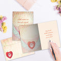 Load image into Gallery viewer, The inside of Tree-Free’s Little Creatures card, with the cover and envelope in the background.