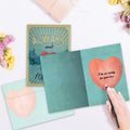Load image into Gallery viewer, The inside of Tree-Free’s Friends Forever card, with the cover and envelope in the background.