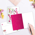 Load image into Gallery viewer, The inside of Tree-Free’s Flowery Thank You Card card, with the cover and envelope in the background.