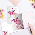 Load image into Gallery viewer, The inside of Tree-Free’s Thinking Of You Butterfly card, with the cover and envelope in the background.
