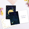 Load image into Gallery viewer, The inside of Tree-Free’s Moon And Back card, with the cover and envelope in the background.