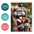 Load image into Gallery viewer, The cover of Tree-Free’s Cat Nap Santa Christmas Card card with lines demonstrating its 5x7 dimensions, along with the following text: “100% PCW recycled paper, proudly made in the USA, sustainably printed on extra-thick card stock”