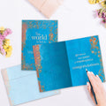 Load image into Gallery viewer, The inside of Tree-Free’s World is But a Canvas card, with the cover and envelope in the background.