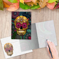 Load image into Gallery viewer, The inside of Tree-Free’s Sugar Skull Paisley Halloween Card card, with the cover and envelope in the background.