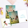 Load image into Gallery viewer, The inside of Tree-Free’s Sweetest Joys card, with the cover and envelope in the background.