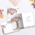 Load image into Gallery viewer, The inside of Tree-Free’s Heart Sing card, with the cover and envelope in the background.